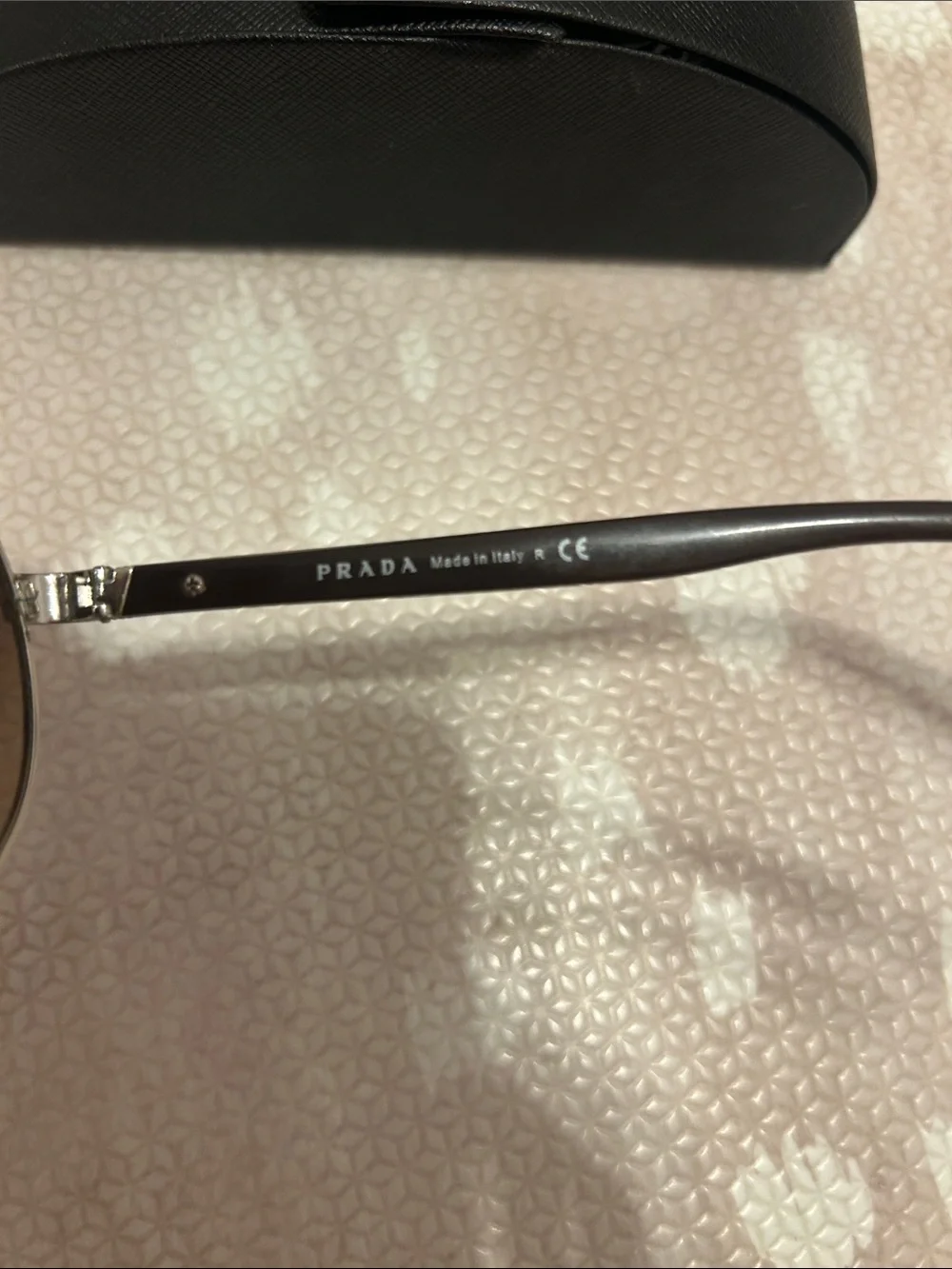 Prada Silver Frame Sunglasses with Brown Gradient Lenses